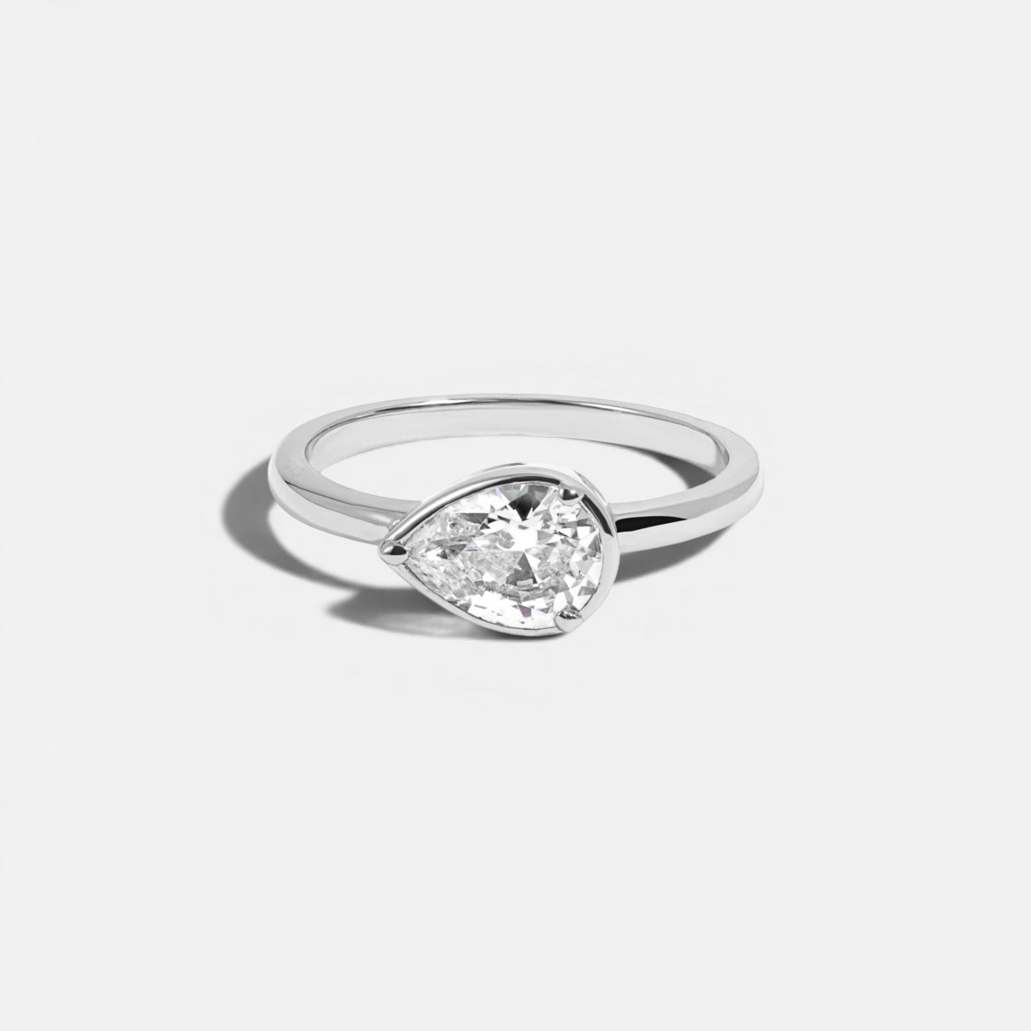 Modern Sideways Pear Bezel CZ Ring
